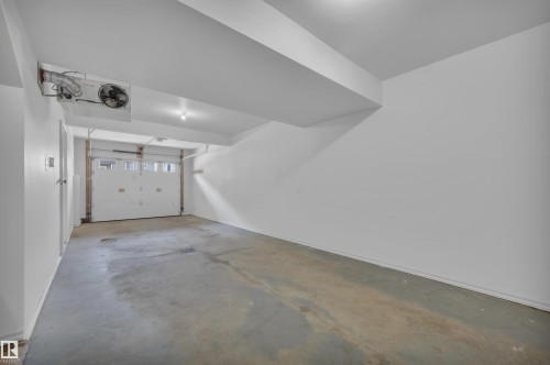 #23 5102 30 Av, Beaumont, AB - Indoor Photo Showing Garage