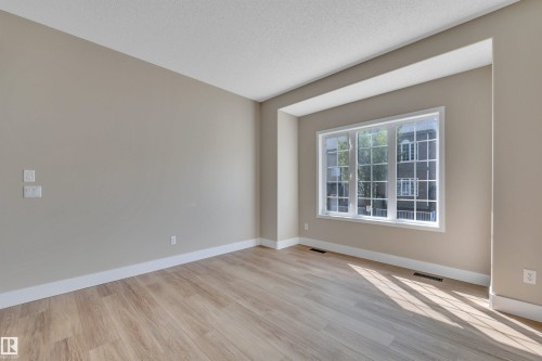 #23 5102 30 Av, Beaumont, AB - Indoor Photo Showing Other Room