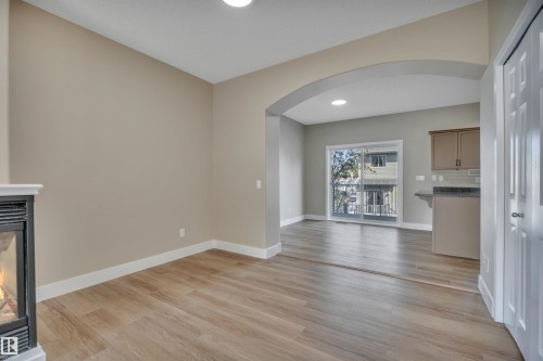 #23 5102 30 Av, Beaumont, AB - Indoor With Fireplace