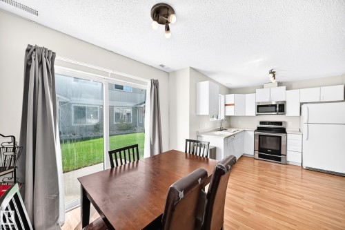 With patio door access to out back. - #158 180 Bridgeport Bv, Leduc, AB - Indoor