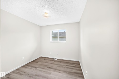 #158 180 Bridgeport Bv, Leduc, AB - Indoor Photo Showing Other Room