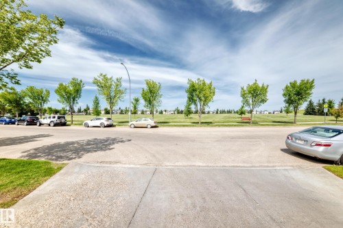 Bridgeport Park seen in Photo just across road from Driveway, 2 minute walk from unit. - #158 180 Bridgeport Bv, Leduc, AB - Outdoor With View