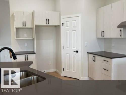 4215 55 Avenue, Lamont, AB - Indoor Photo Showing Kitchen With Double Sink