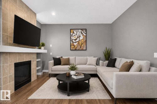 2225 Calhoun Link Link Sw, Edmonton, AB - Indoor Photo Showing Living Room With Fireplace