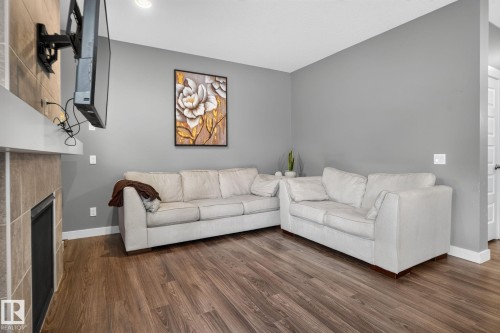 2225 Calhoun Link Link Sw, Edmonton, AB - Indoor Photo Showing Living Room With Fireplace
