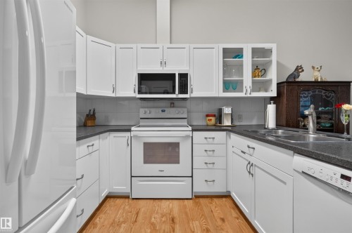 #112 78 Mckenney Av, St. Albert, AB - Indoor Photo Showing Kitchen With Double Sink