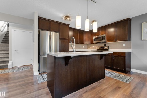 6945 Evans Wynd Nw, Edmonton, AB - Indoor Photo Showing Kitchen With Upgraded Kitchen