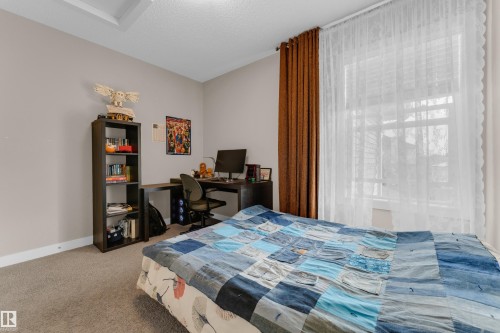 6945 Evans Wynd Nw, Edmonton, AB - Indoor Photo Showing Bedroom