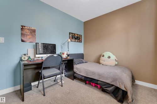 6945 Evans Wynd Nw, Edmonton, AB - Indoor Photo Showing Bedroom