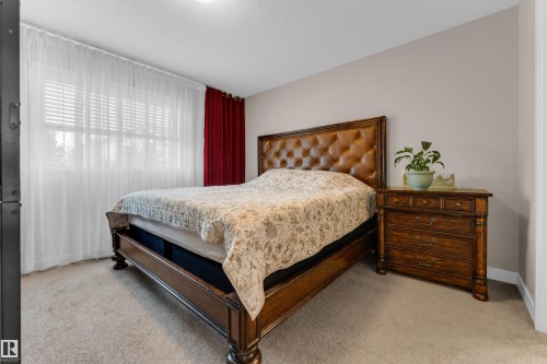 6945 Evans Wynd Nw, Edmonton, AB - Indoor Photo Showing Bedroom