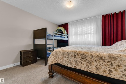 6945 Evans Wynd Nw, Edmonton, AB - Indoor Photo Showing Bedroom