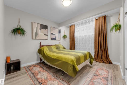 6945 Evans Wynd Nw, Edmonton, AB - Indoor Photo Showing Bedroom