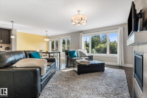 1511 Westerra Bend, Stony Plain, AB - Indoor Photo Showing Living Room With Fireplace