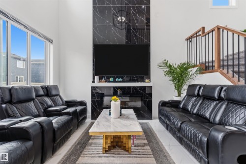 3606 41 Ave, Beaumont, AB - Indoor Photo Showing Living Room With Fireplace