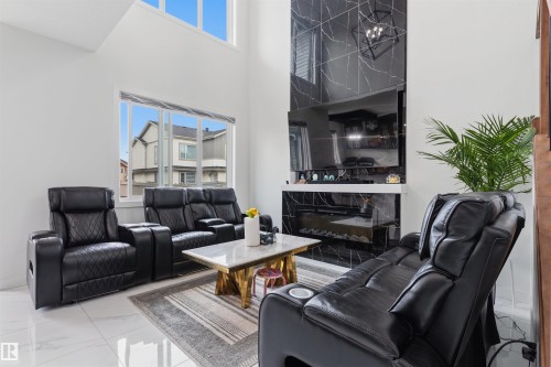 3606 41 Ave, Beaumont, AB - Indoor Photo Showing Living Room With Fireplace