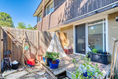 Private outdoor space with wood fencing and a wooden deck - 2730 105 Street Nw, Edmonton, AB - Outdoor With Deck Patio Veranda With Exterior