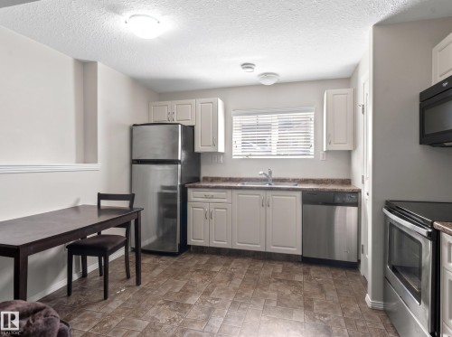 110 26 Street, Cold Lake, AB - Indoor Photo Showing Kitchen With Double Sink