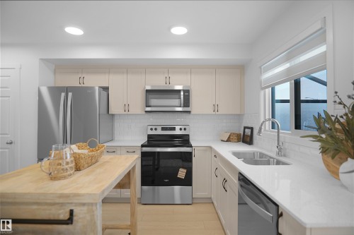 5139 River'S Edge Way Nw, Edmonton, AB - Indoor Photo Showing Kitchen With Double Sink With Upgraded Kitchen