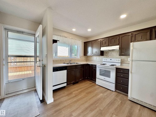 2423 83 Street Nw, Edmonton, AB - Indoor Photo Showing Kitchen With Double Sink