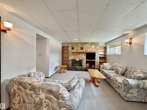 2423 83 Street Nw, Edmonton, AB - Indoor With Fireplace