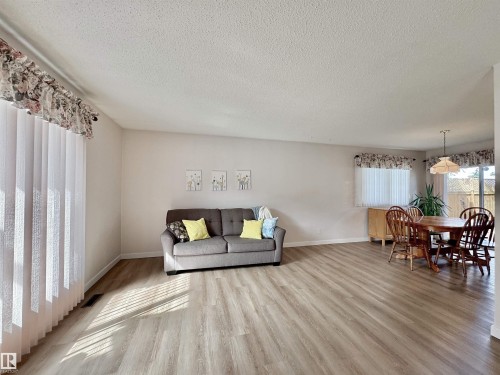 2423 83 Street Nw, Edmonton, AB - Indoor Photo Showing Living Room