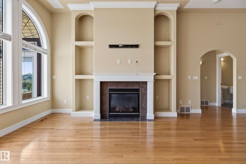 25 Normandeau Crescent, St. Albert, AB - Indoor Photo Showing Living Room With Fireplace