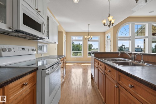 25 Normandeau Crescent, St. Albert, AB - Indoor Photo Showing Kitchen With Double Sink