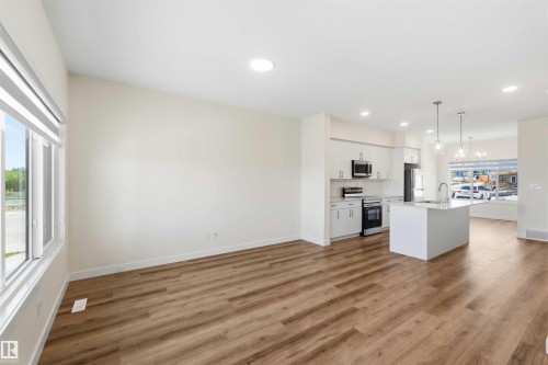 4582 Warbler Loop Nw, Edmonton, AB - Indoor Photo Showing Kitchen With Upgraded Kitchen