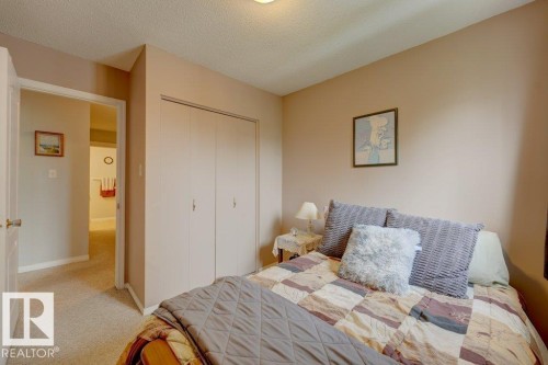 Neutral-toned walls complement the carpeted flooring - 307 Northgate Terrace Nw, Edmonton, AB - Indoor Photo Showing Bedroom