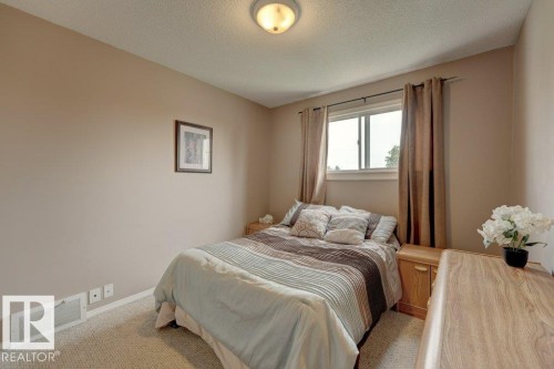 Wall-to-wall carpeting, neutral wall color, and overhead lighting - 307 Northgate Terrace Nw, Edmonton, AB - Indoor Photo Showing Bedroom