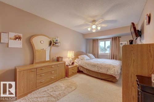 Wall-to-wall carpeting and a ceiling fan with integrated lighting - 307 Northgate Terrace Nw, Edmonton, AB - Indoor Photo Showing Bedroom