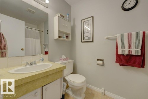Single vanity with an integrated sink and cabinet storage - 307 Northgate Terrace Nw, Edmonton, AB - Indoor Photo Showing Bathroom