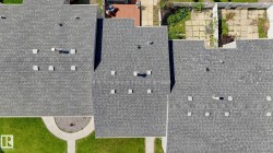 Asphalt shingle roofing with multiple vents - 