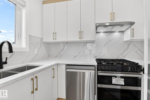 8790 Mayday Lane Sw, Edmonton, AB - Indoor Photo Showing Kitchen With Double Sink With Upgraded Kitchen