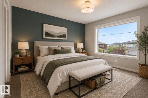 Recessed ceiling lighting, a wide window with white trim, and a built-in closet with white doors - 2355 Kelly Circle Circle Sw, Edmonton, AB - Indoor Photo Showing Bedroom