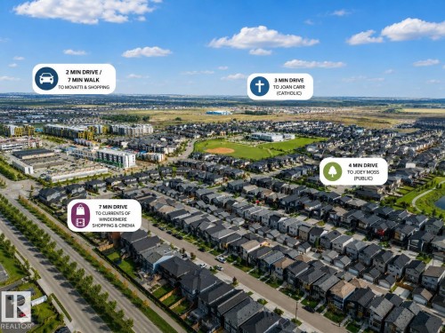 Aerial perspective showcasing a residential neighborhood with varied housing styles - 2355 Kelly Circle Circle Sw, Edmonton, AB - Outdoor With View