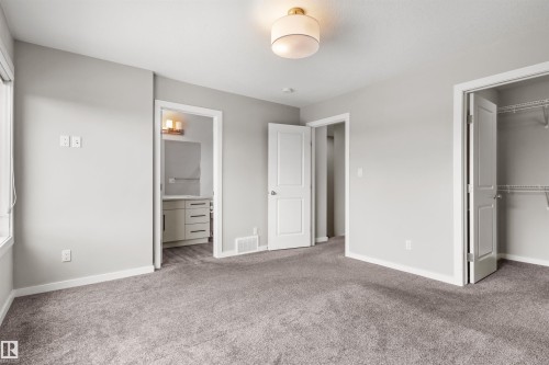 Plush gray carpeting with light gray walls - 2355 Kelly Circle Circle Sw, Edmonton, AB - Indoor