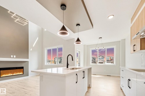 4643 17 Avenue Sw, Edmonton, AB - Indoor Photo Showing Kitchen With Fireplace