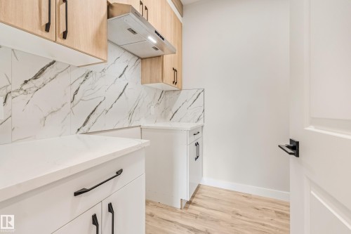 4643 17 Avenue Sw, Edmonton, AB - Indoor Photo Showing Laundry Room
