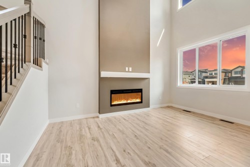 4643 17 Avenue Sw, Edmonton, AB - Indoor Photo Showing Other Room With Fireplace