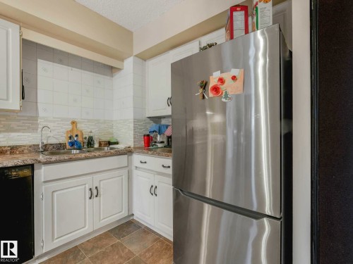 Image quality insufficient for description - 13405 40 St Nw, Edmonton, AB - Indoor Photo Showing Kitchen With Double Sink With Upgraded Kitchen