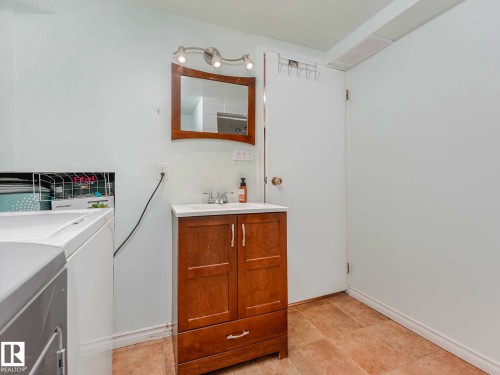 Image quality insufficient for description - 13405 40 St Nw, Edmonton, AB - Indoor Photo Showing Laundry Room