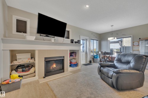 956 Morris Way, Leduc, AB - Indoor Photo Showing Living Room With Fireplace