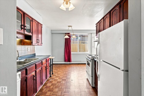 #104 7805 159 St Nw, Edmonton, AB - Indoor Photo Showing Kitchen With Double Sink