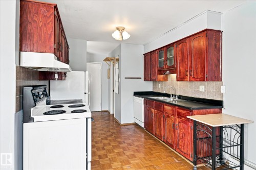 #104 7805 159 St Nw, Edmonton, AB - Indoor Photo Showing Kitchen With Double Sink