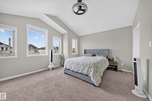 Vaulted ceilings with a ceiling fan light fixture - 1927 51 Street Sw, Edmonton, AB - Indoor Photo Showing Bedroom