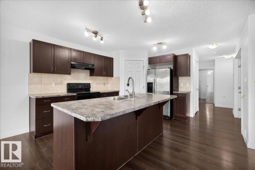 3017 Harvey Crescent Nw, Edmonton, AB - Indoor Photo Showing Kitchen With Double Sink