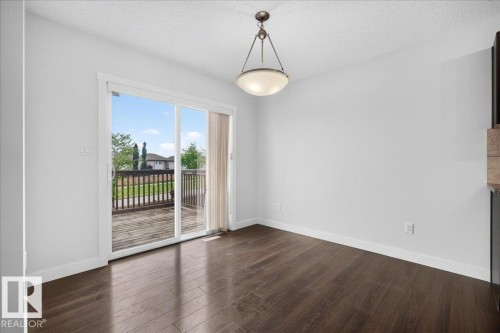 3017 Harvey Crescent Nw, Edmonton, AB - Indoor Photo Showing Other Room With Fireplace