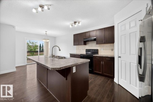 3017 Harvey Crescent Nw, Edmonton, AB - Indoor Photo Showing Kitchen With Double Sink