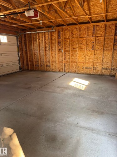 double garage - 15112 139 Street Nw, Edmonton, AB - Indoor Photo Showing Garage
